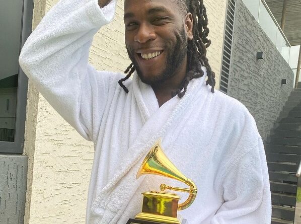 Burna Boy Finally Receives his Grammy Plaque