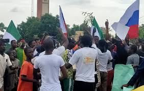 Presidency Reacts To Non-Nigerian Flag Raised by Protesters
