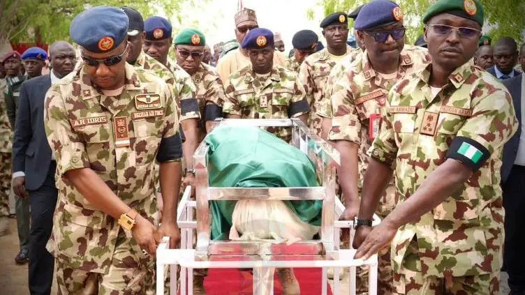Fallen General Laid to Rest Amid Fresh Attacks