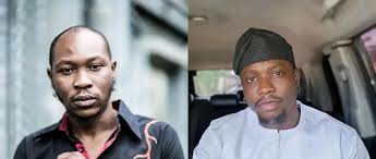 Seun Kuti, VeryDarkMan unfollow each other